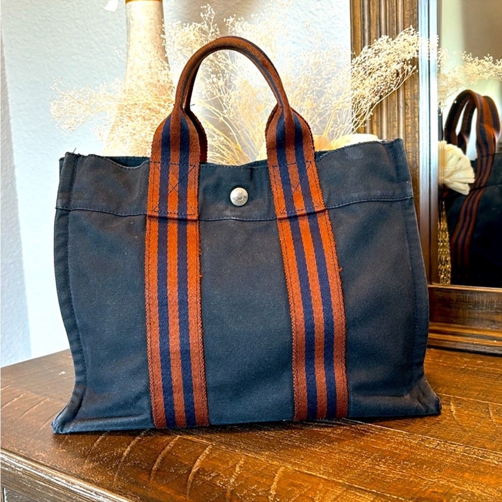 Hermes Toile Fourre-Tout PM. In good used condition. Distress look.